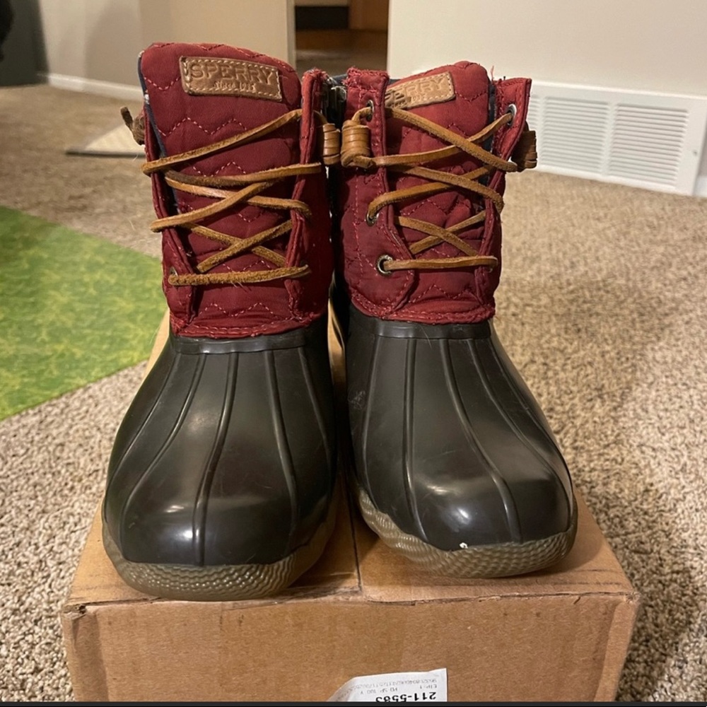Red and brown Sperry duck boots